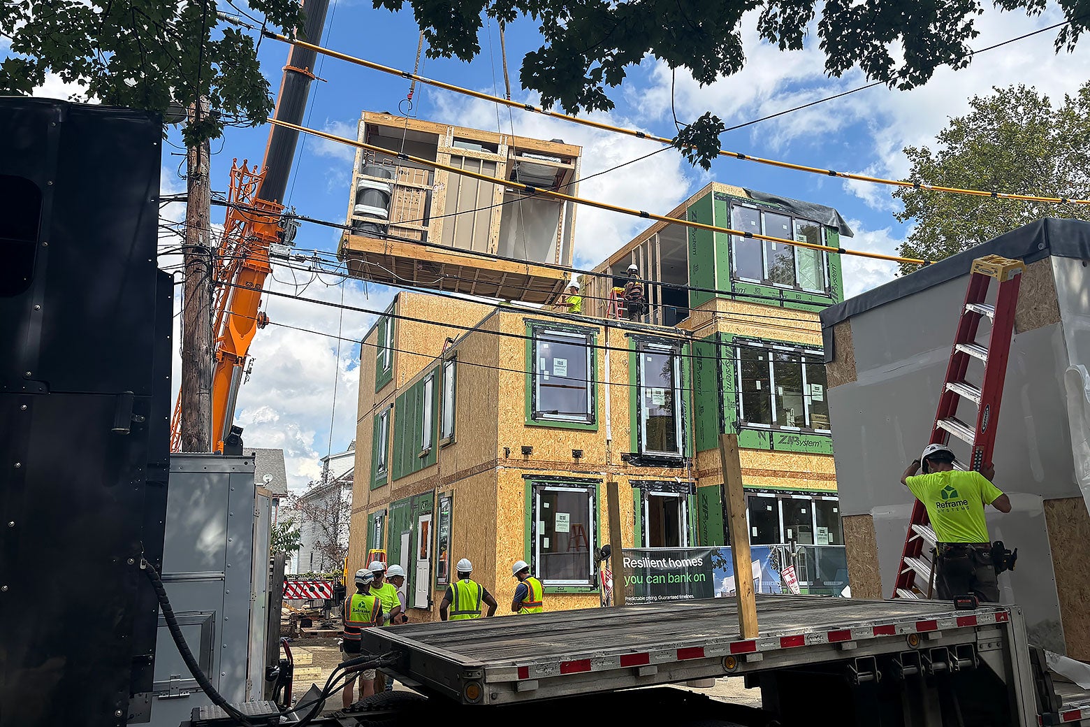 A modular home being assembled.