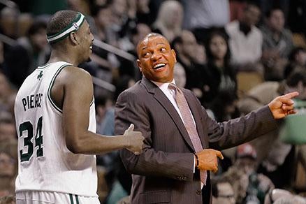 Doc Rivers and Paul Pierce at a game against the Detroit Pistons.