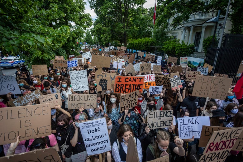 Protesters take part in a Black Lives Matter march in front of the U.S. embassy in Warsaw, Poland on June 6, 2020.