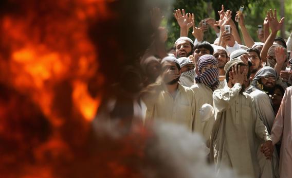 Islamic students burn videos