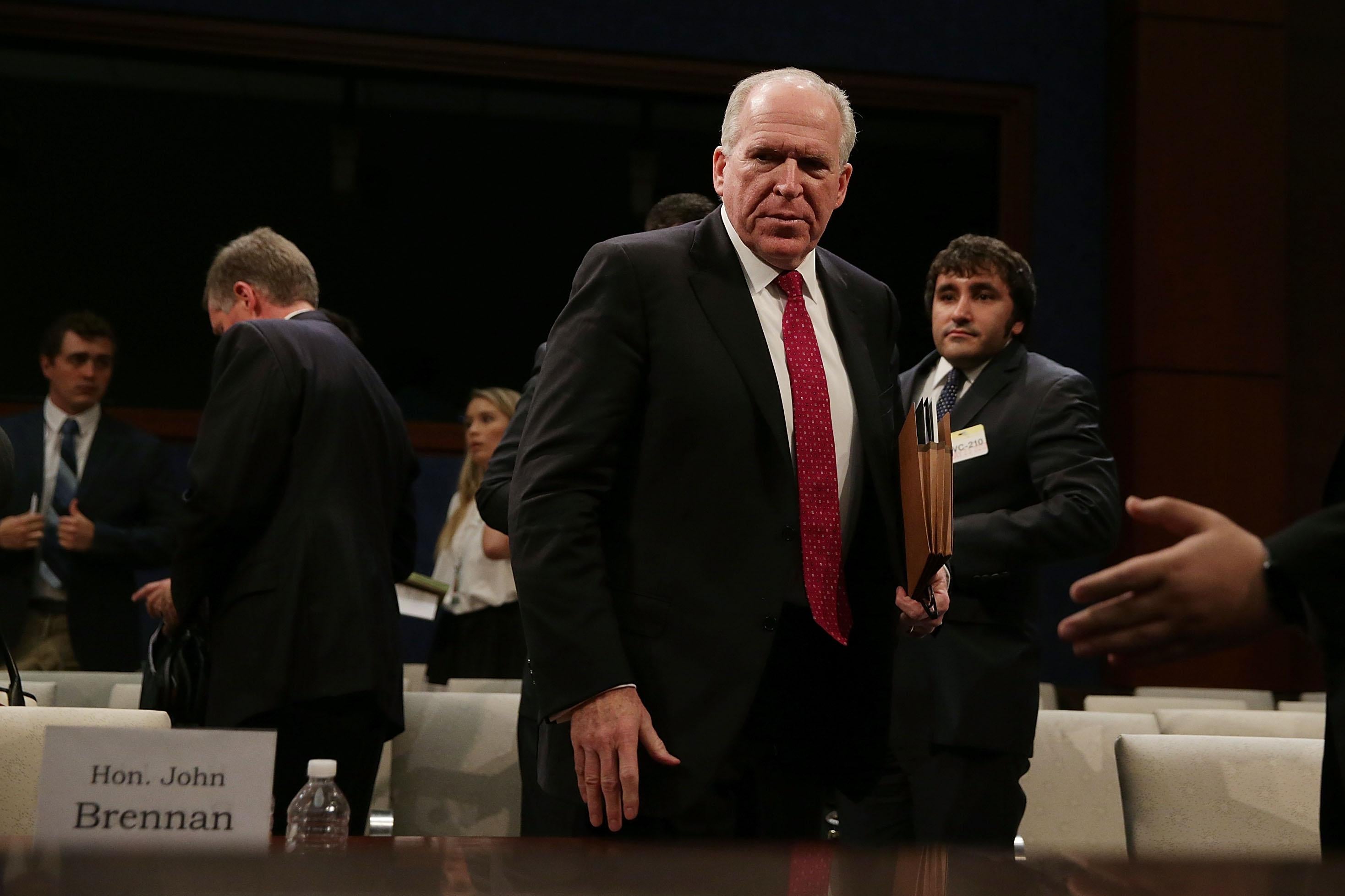 Former CIA Director John Brennan leaves Capitol Hill after testifying at an open session of the House Permanent Select Committee on Intelligence on May 23, 2017.