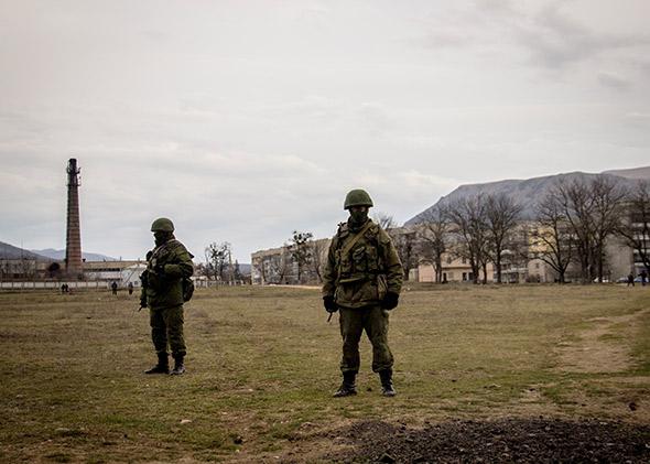 Russian forces have taken several Ukrainian military installations in Crimea without firing any shots.
