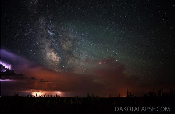 Shooting star with the Milky Way and a storm