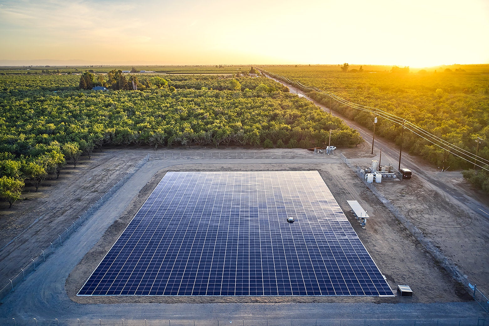 A solar array in Madera County, California, with panels placed side-by-side on the ground.