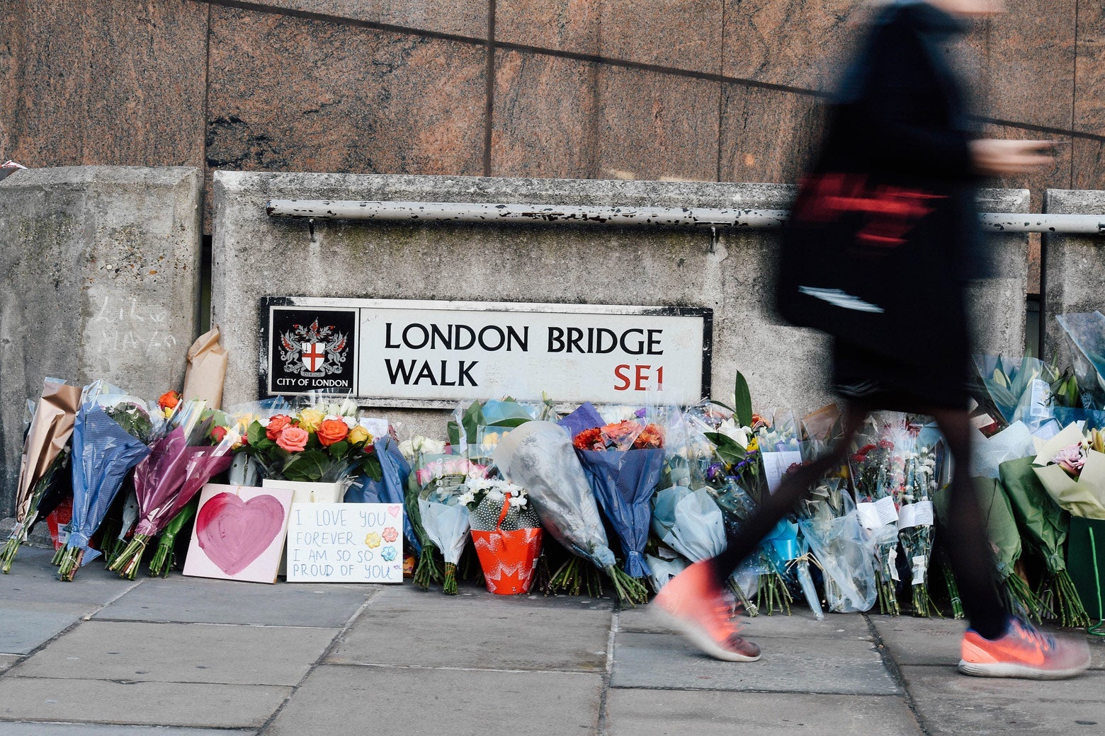Bouquets of flowers are placed on London Bridge.