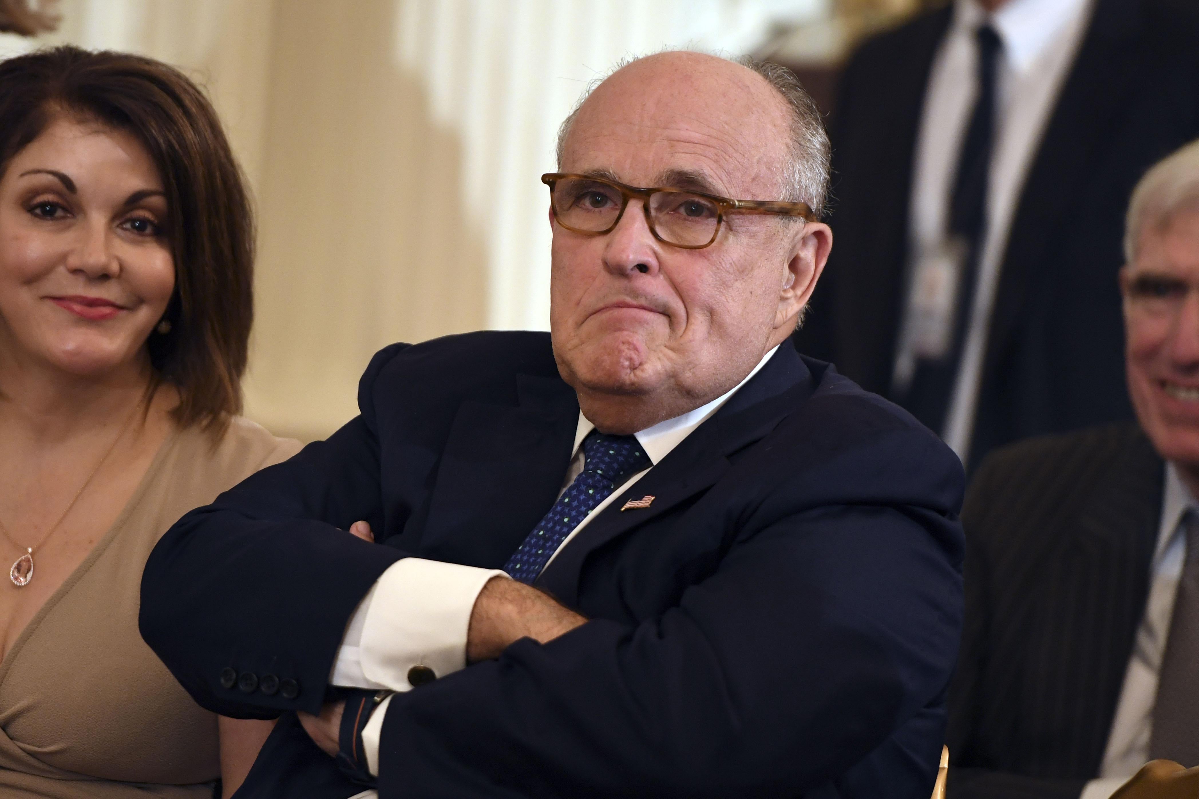 Rudolph Giuliani looks on before President Donald Trump announces his Supreme Court nominee in the East Room of the White House on July 9, 2018 in Washington, D.C.
