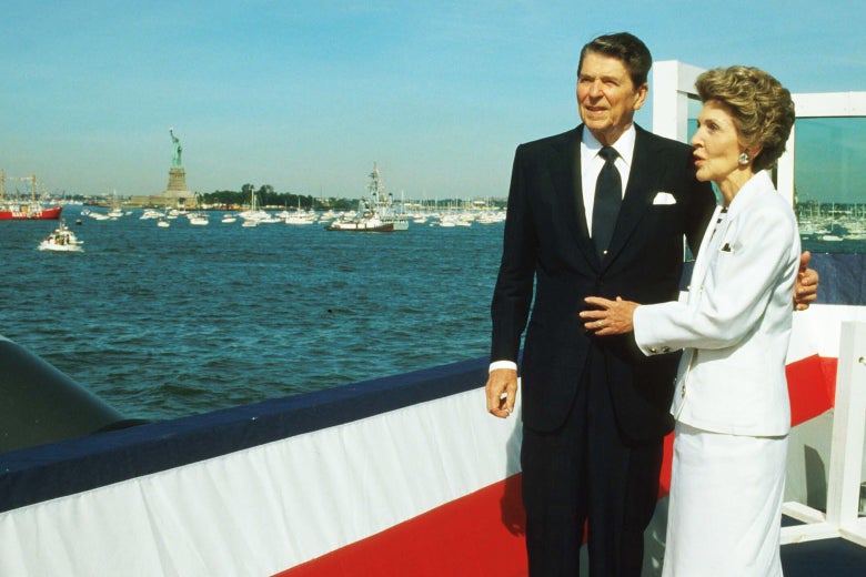President Ronald Reagan stands with his wife Nancy during the Statue of Liberty’s centennial celebration on July 4, 1986, in New York City.