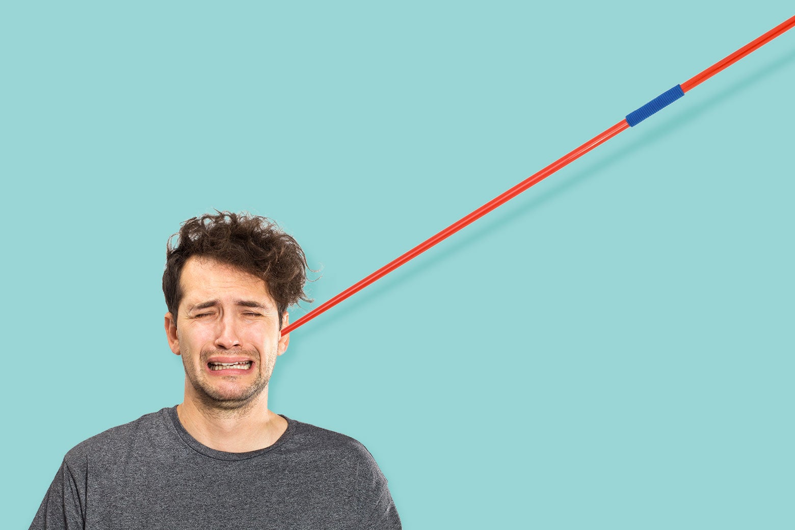 An illustration of a young, white man grimacing as a javelin sticks diagonally out of his left ear. 