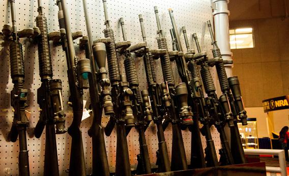 A wall of semi-automatic rifles at the National Rifle Association Annual Meetings and Exhibits 