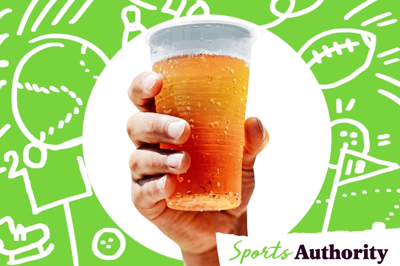 Plastic cup of beer at a sports game.