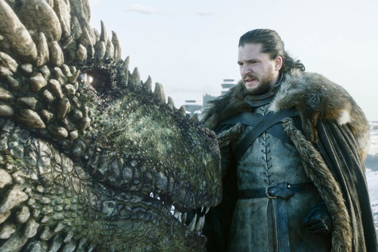 Jon Snow pets a dragon.