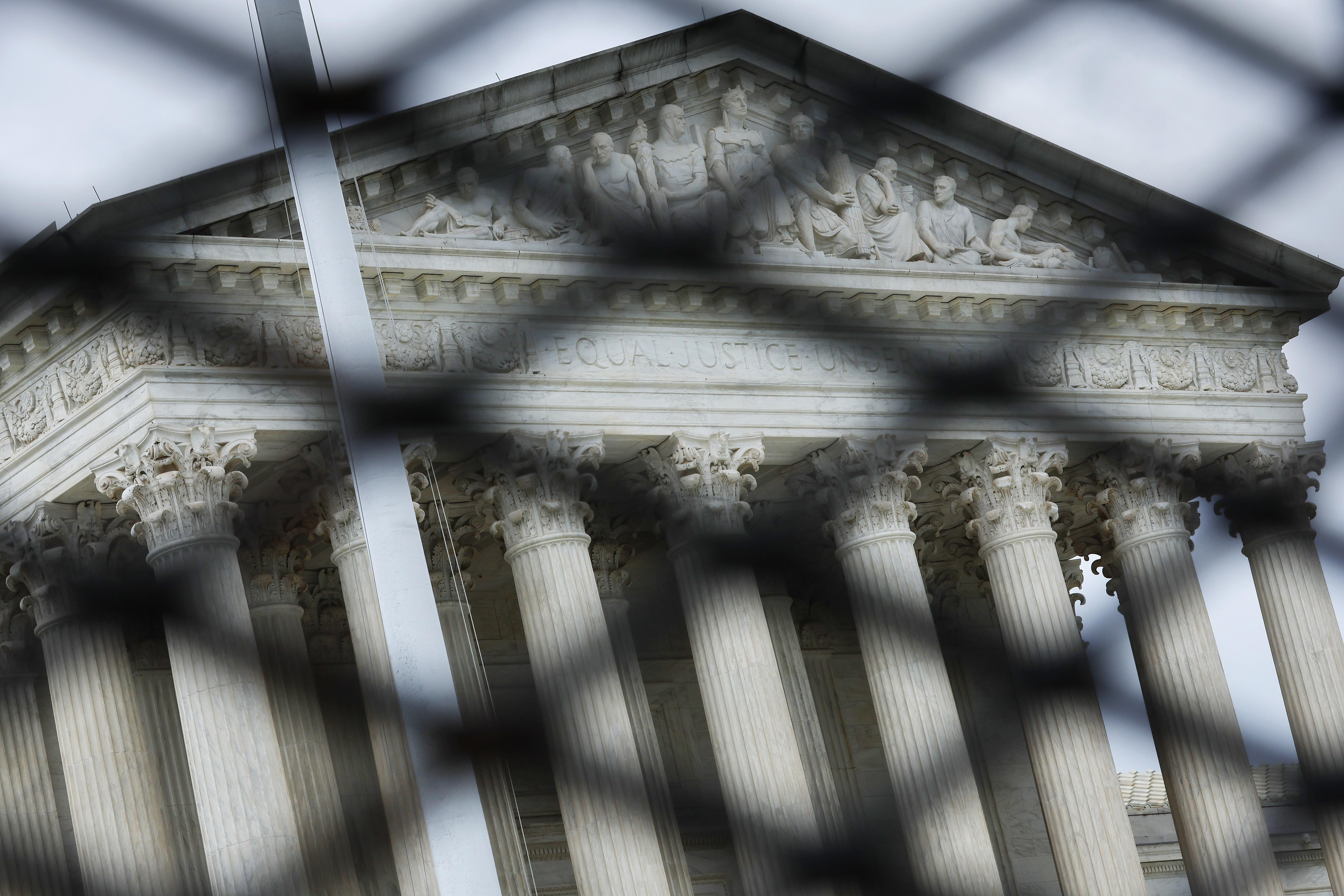 The Supreme Court behind protective fencing