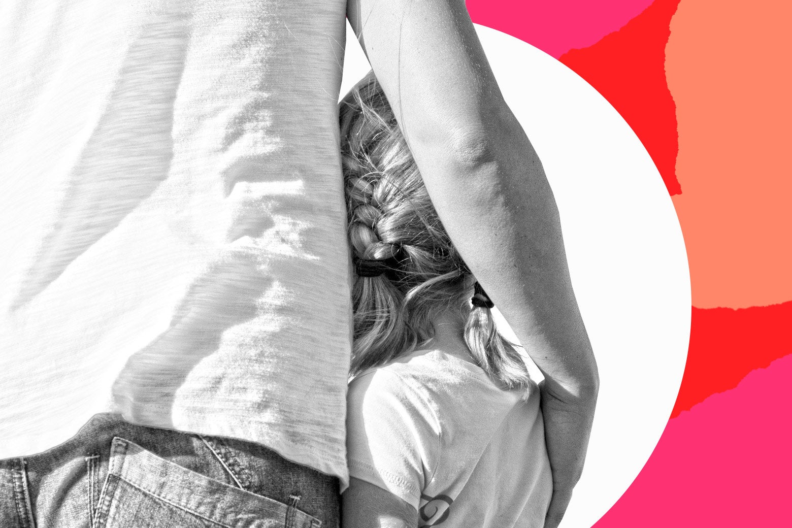 A parent puts an arm around a child.