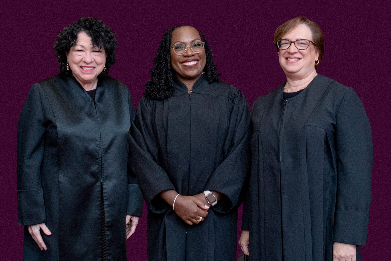 Justices Kagan, Jackson, and Sotomayor, all in robes on a maroon background.