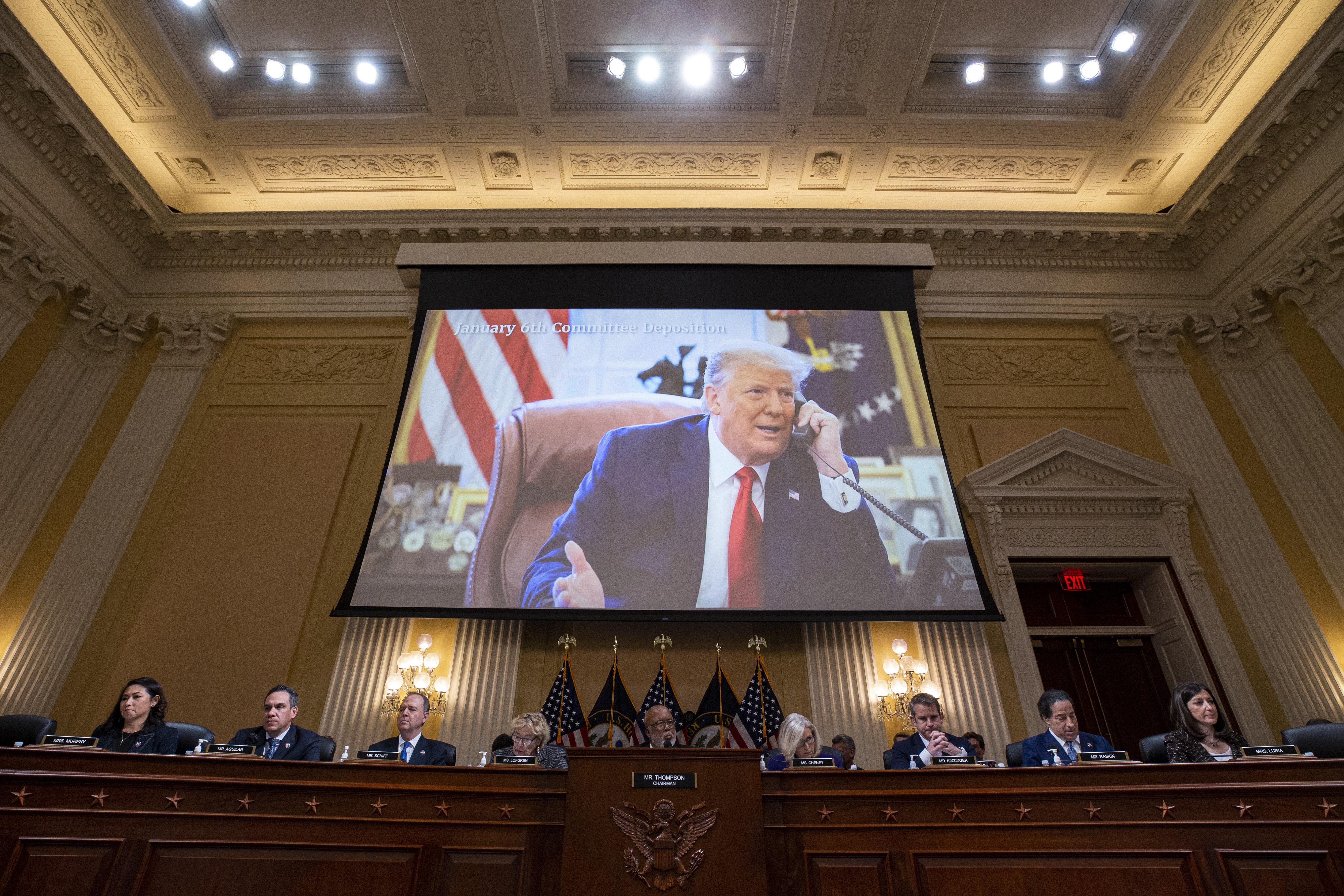 Image of former U.S. President Donald Trump displayed on a screen.