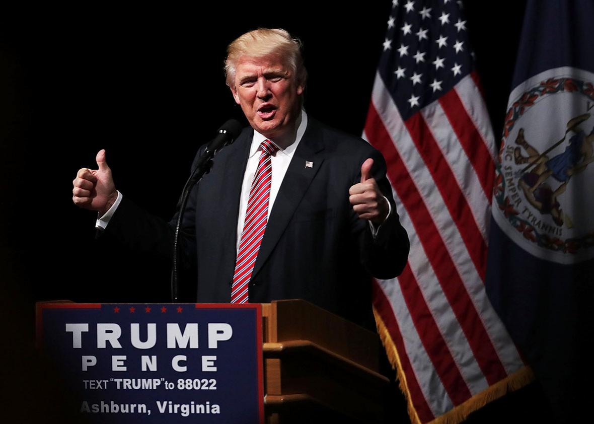 Republican presidential nominee Donald Trump holds two thumbs up during a campaign event at Briar Woods High School August 2, 2016 in Ashburn, Virginia. 
