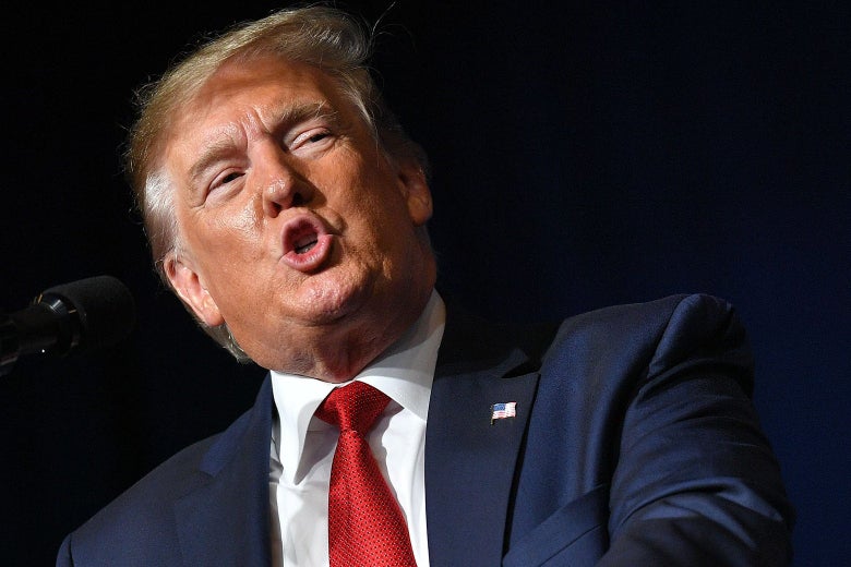 Donald Trump at a podium.