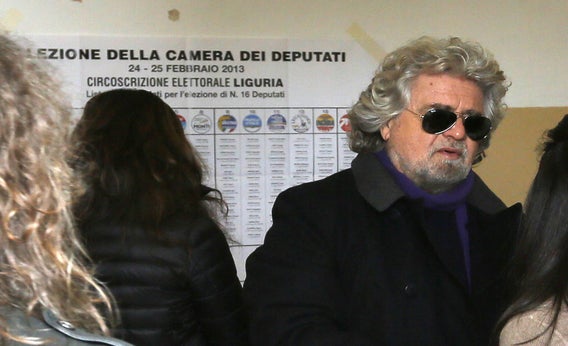 Five Stars movement's leader and former comedian Beppe Grillo arrives to vote at a polling station in St. Ilario near Genova on Feb. 25, 2013.