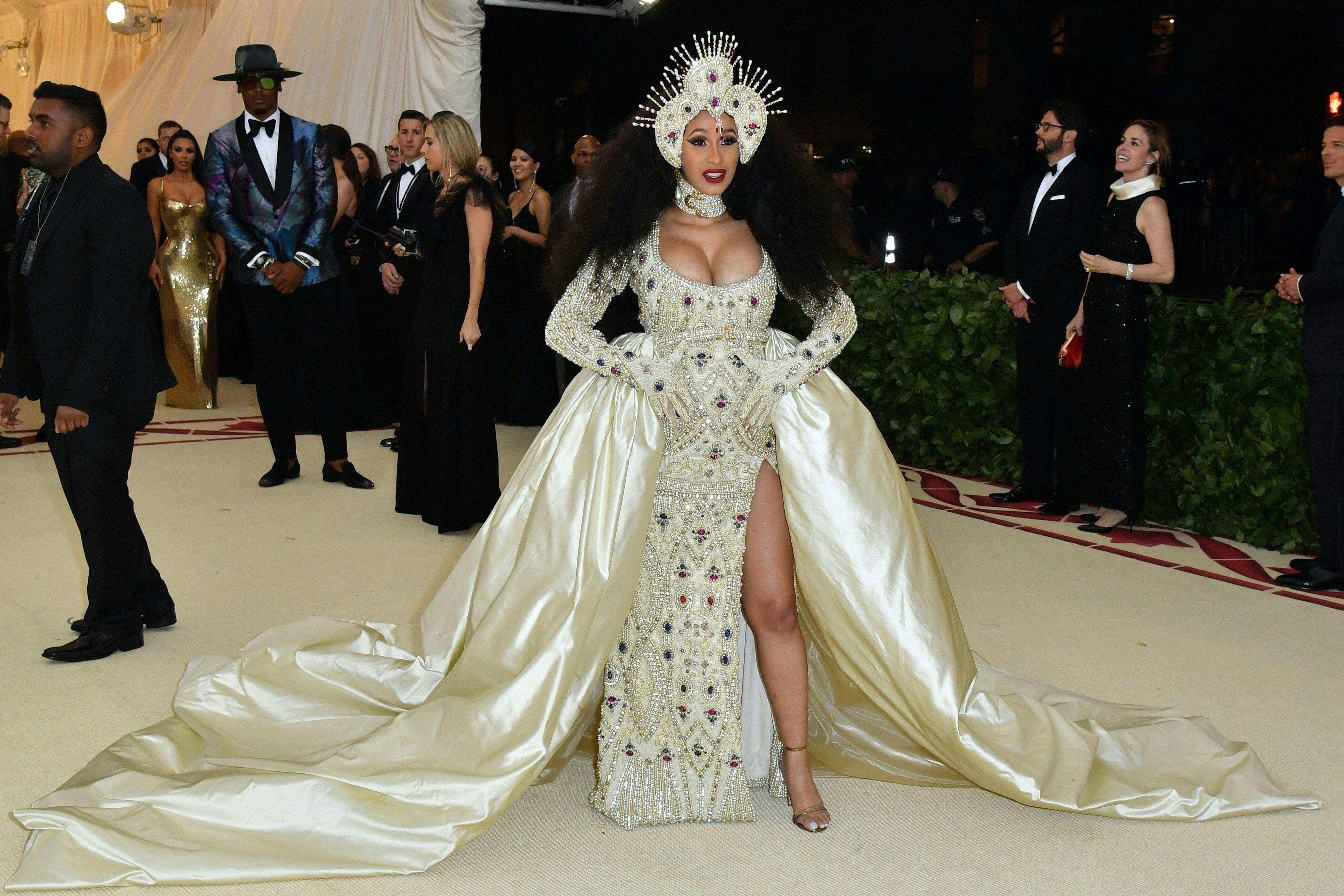 Cardi B arrives for the 2018 Met Gala on May 7, 2018, at the Metropolitan Museum of Art in New York. - The Gala raises money for the Metropolitan Museum of Arts Costume Institute. The Gala's 2018 theme is Heavenly Bodies: Fashion and the Catholic Imagination. (Photo by Angela WEISS / AFP) (Photo credit should read ANGELA WEISS/AFP/Getty Images)