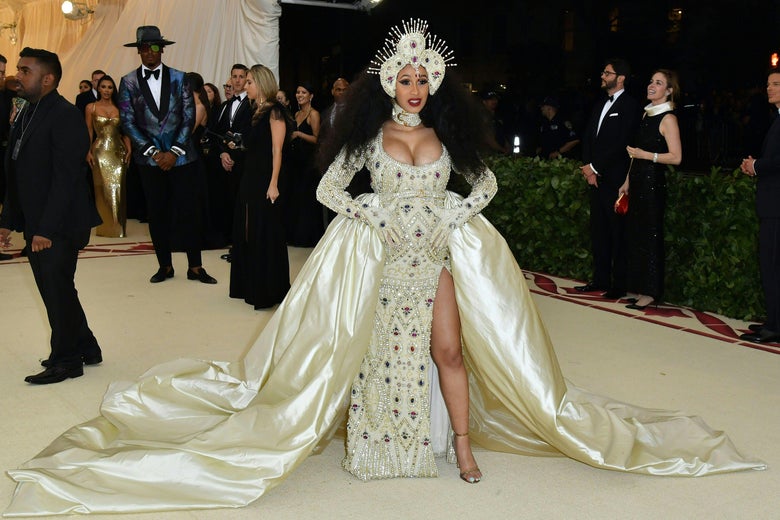 Cardi B arrives for the 2018 Met Gala on May 7, 2018, at the Metropolitan Museum of Art in New York. - The Gala raises money for the Metropolitan Museum of Arts Costume Institute. The Gala's 2018 theme is Heavenly Bodies: Fashion and the Catholic Imagination. (Photo by Angela WEISS / AFP)        (Photo credit should read ANGELA WEISS/AFP/Getty Images)
