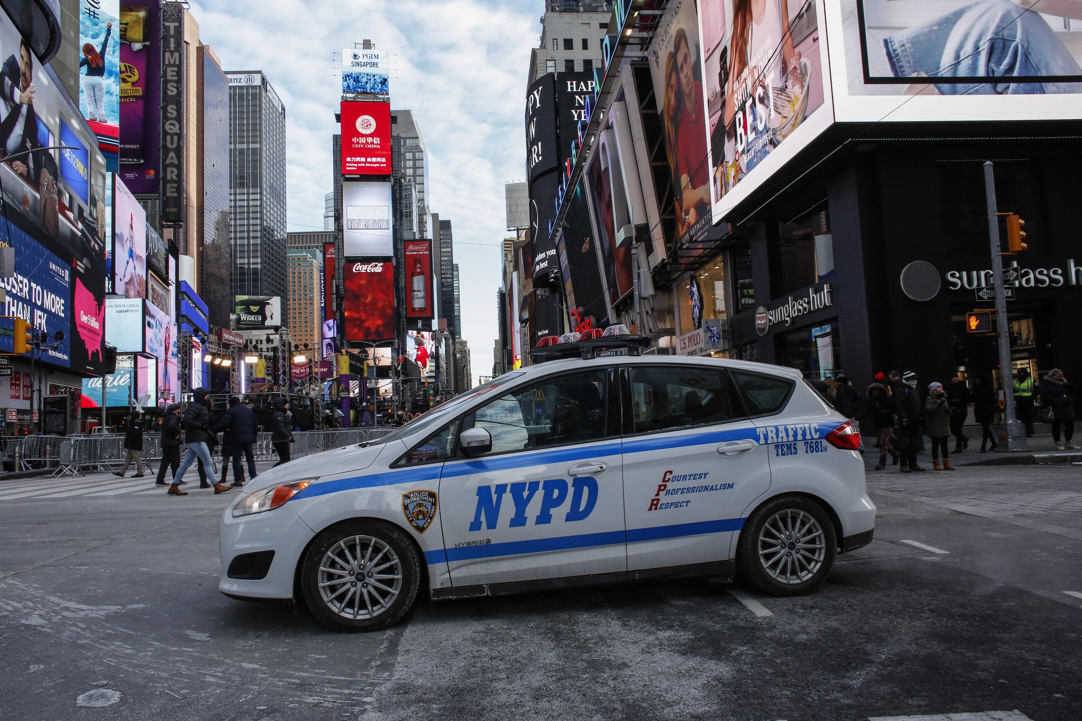 A New York Police Department (NYPD) car is parked in Times Square prior to New Year's Eve celebrations on December 31, 2017 in New York City. 