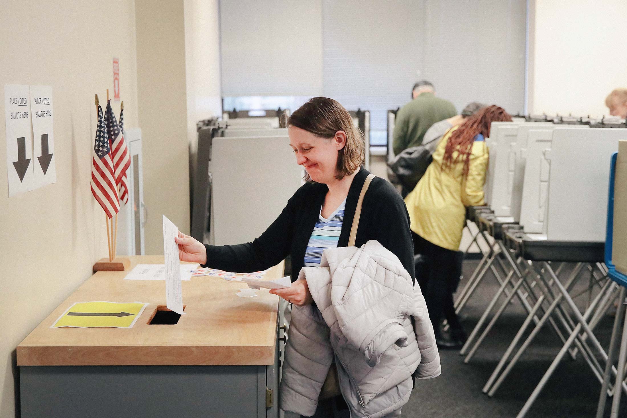 Voters cast ballots for the midterm elections at the Polk County Election Office