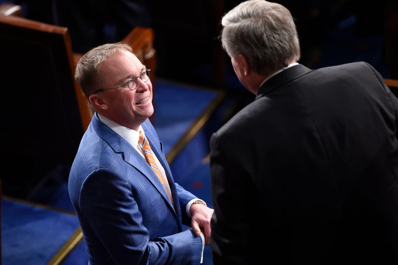 Mulvaney smiling in the House chamber.