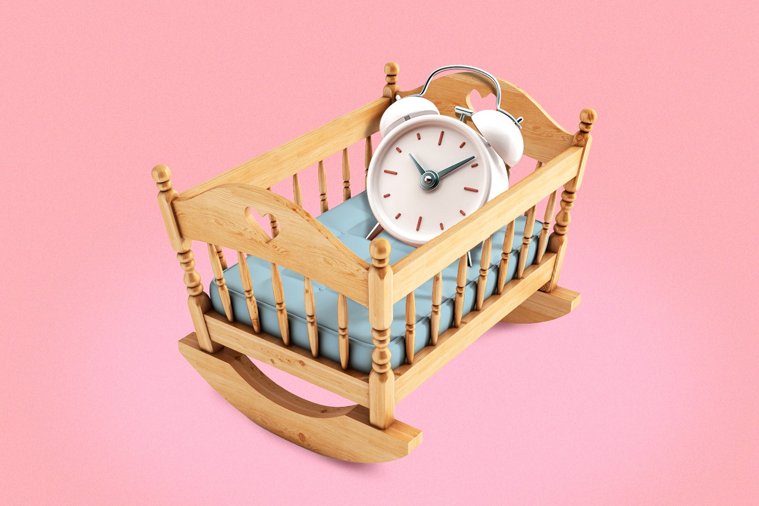 An alarm clock sits in a crib.