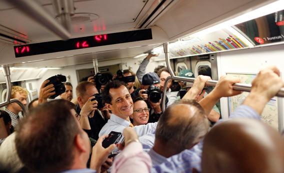 Former U.S. Congressman and New York City mayoral candidate Anthony Weiner rides the subway between campaign events in New York, May 23, 2013.