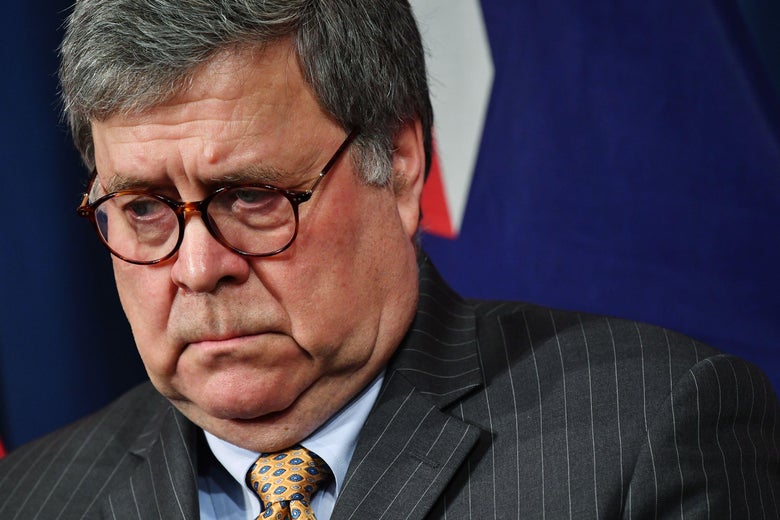 Bill Barr in a pinstriped suit.