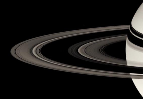 Saturn with Rings Around it and a Star in the Background Stock Image -  Image of background, sphere: 273538453