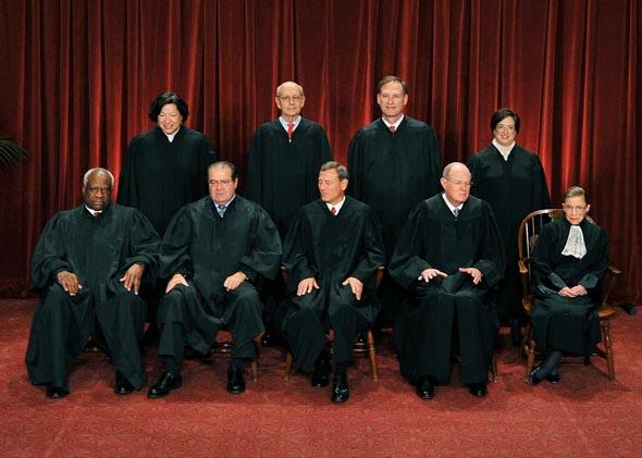 The Justices of the US Supreme Court sit for their official photograph on October 8, 2010 at the Supreme Court in Washington, DC. 
