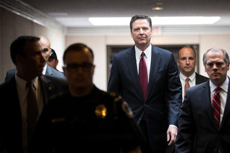 Former FBI Director James Comey leaves a closed session with the Senate Intelligence Committee in the Hart Senate Office Building on Capitol Hill June 8, 2017 in Washington, DC. Comey said that President Donald Trump pressured him to drop the FBI's investigation into former National Security Advisor Michael Flynn and demanded Comey's loyalty during the one-on-one meetings he had with president.