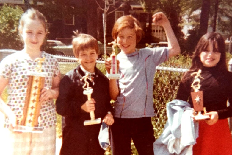 The author, far right, holding a candlepin bowling trophy, like everyone else.