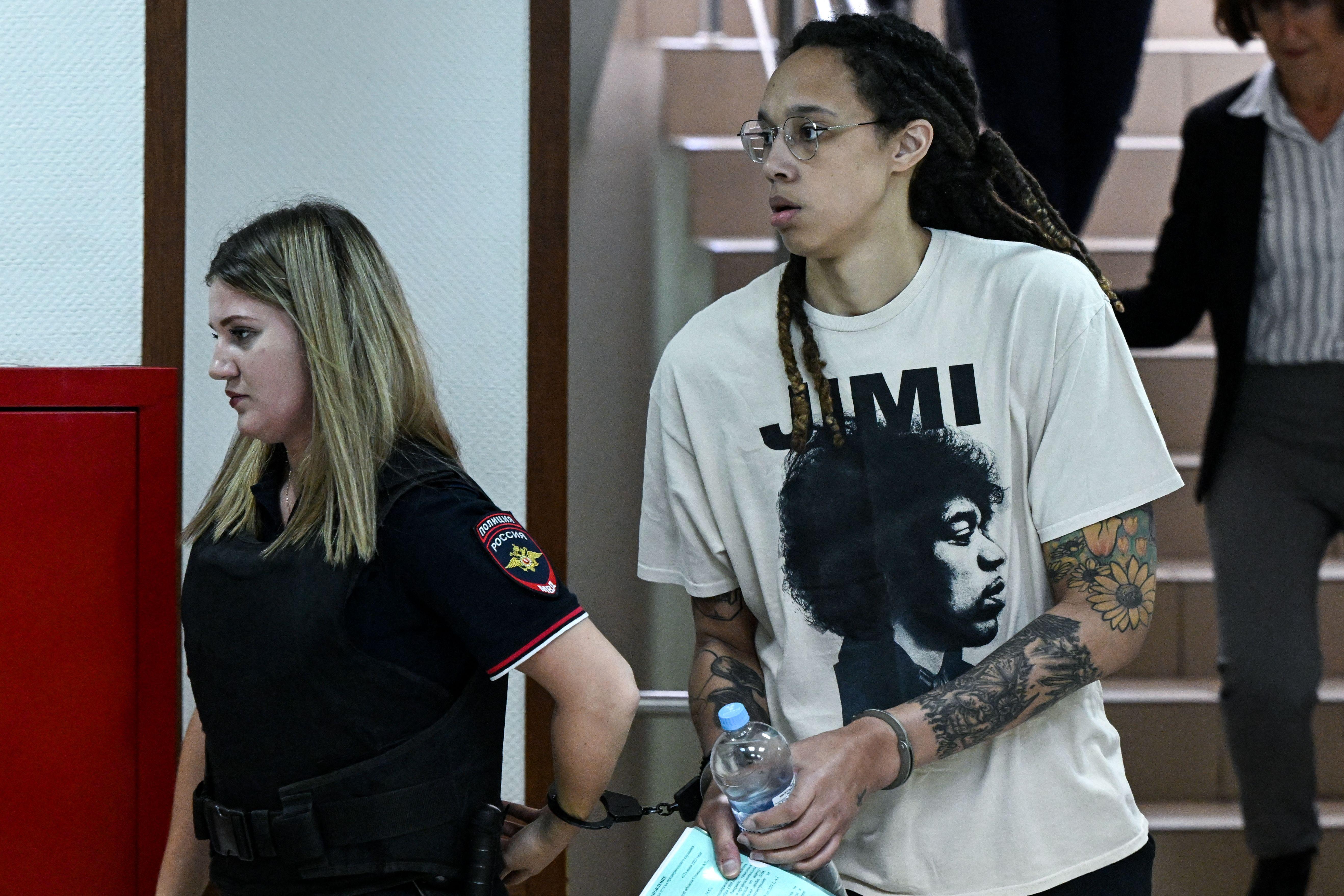 US WNBA basketball superstar Brittney Griner arrives to a hearing at the Khimki Court, outside Moscow on July 1, 2022. - Griner, a two-time Olympic gold medallist and WNBA champion, was detained at Moscow airport in February on charges of carrying in her luggage vape cartridges with cannabis oil, which could carry a 10-year prison sentence. (Photo by Kirill KUDRYAVTSEV / AFP) (Photo by KIRILL KUDRYAVTSEV/AFP via Getty Images)