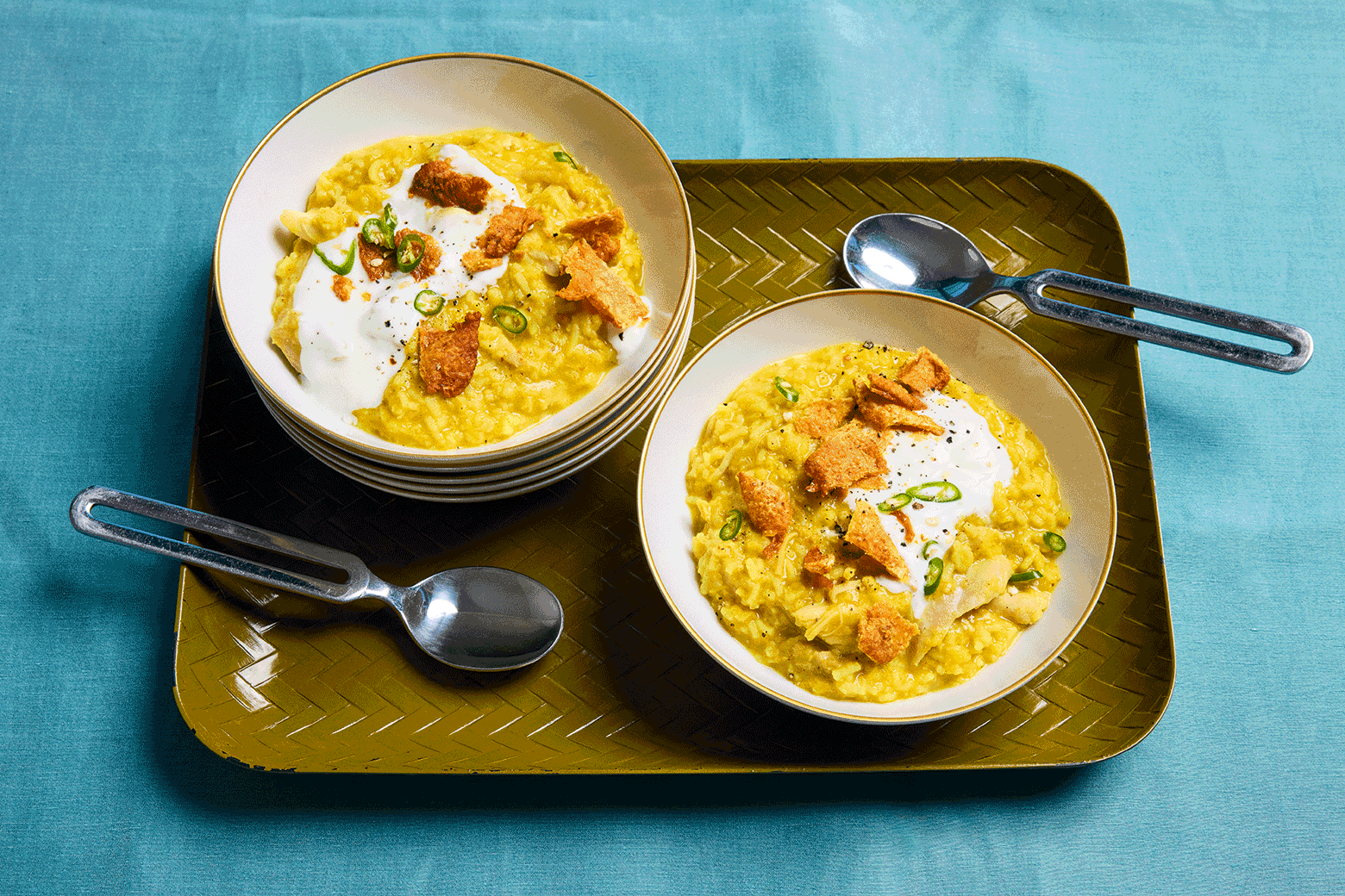 recipes Hearty yellow stew topped with chicken and yogurt.