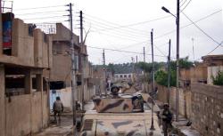 Jundis patrolling a typical Khalidiya street