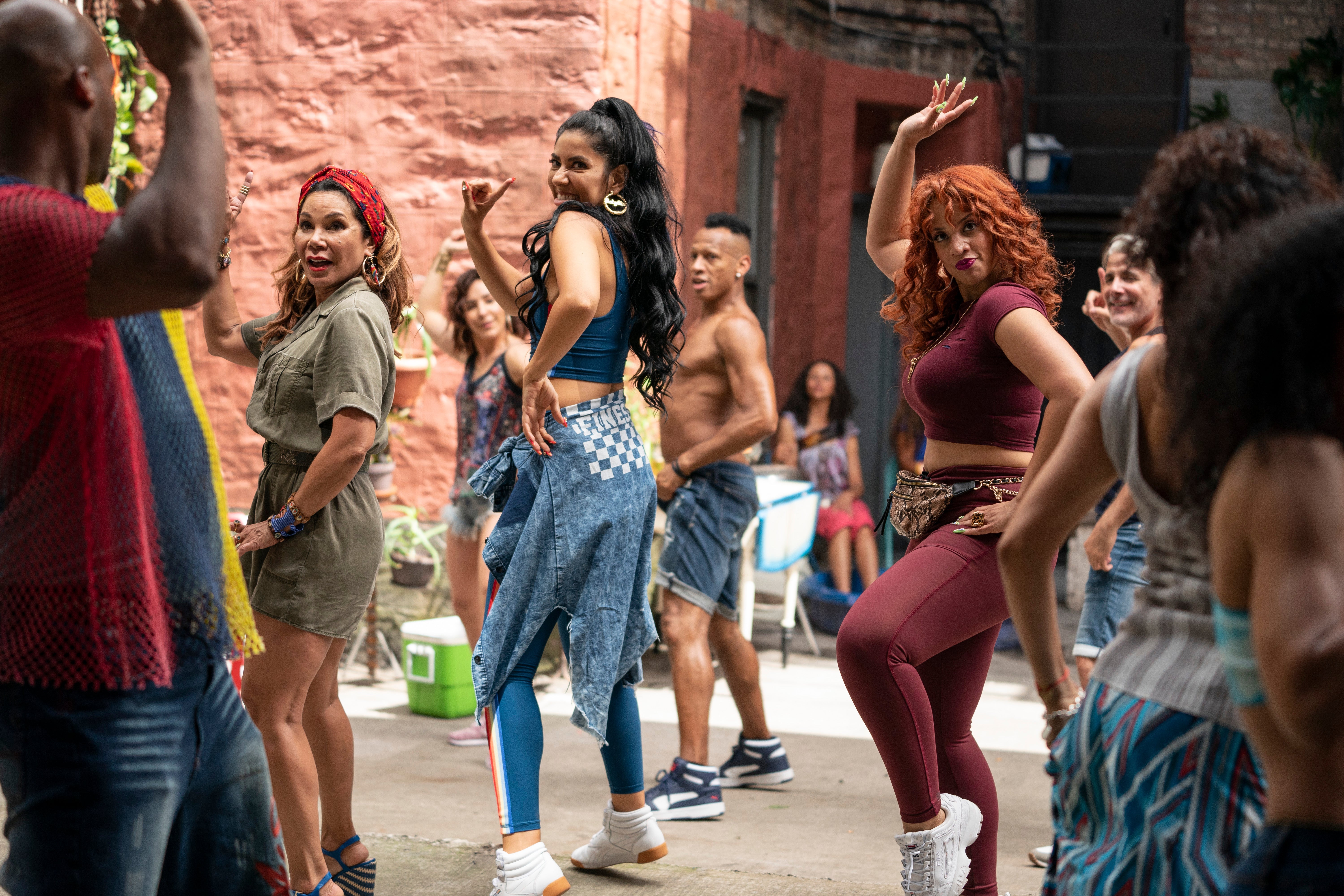 In the Heights' salon ladies dance at the Carnaval del Barrio.