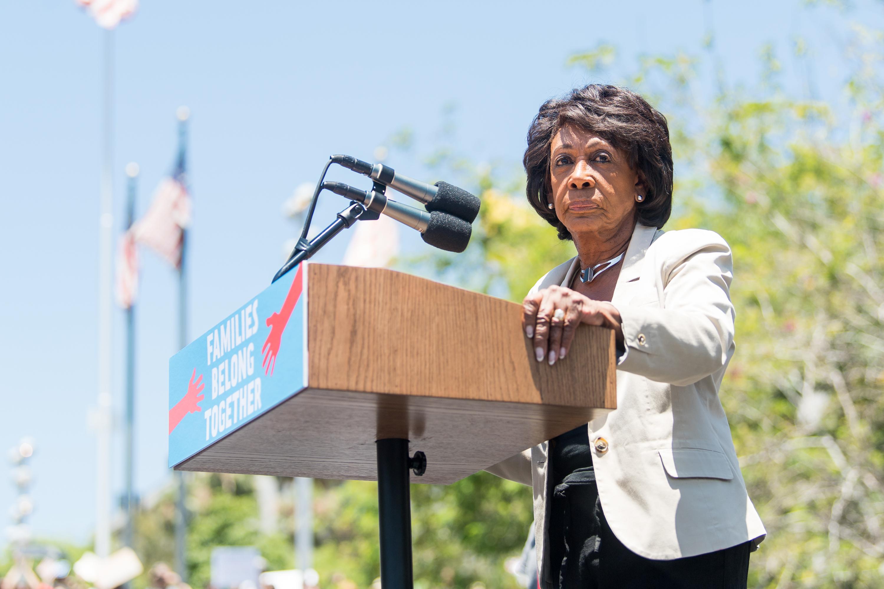 Maxine Waters speaks onstage at the Families Belong Together rally in Los Angeles on June 30, 2018.