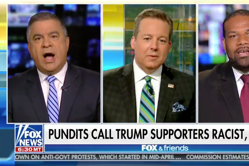 David Bossie (left) gets into a heated discussion with Democratic strategist Joel Payne as Fox News host Ed Henry tries to moderate on June 24, 2018. 