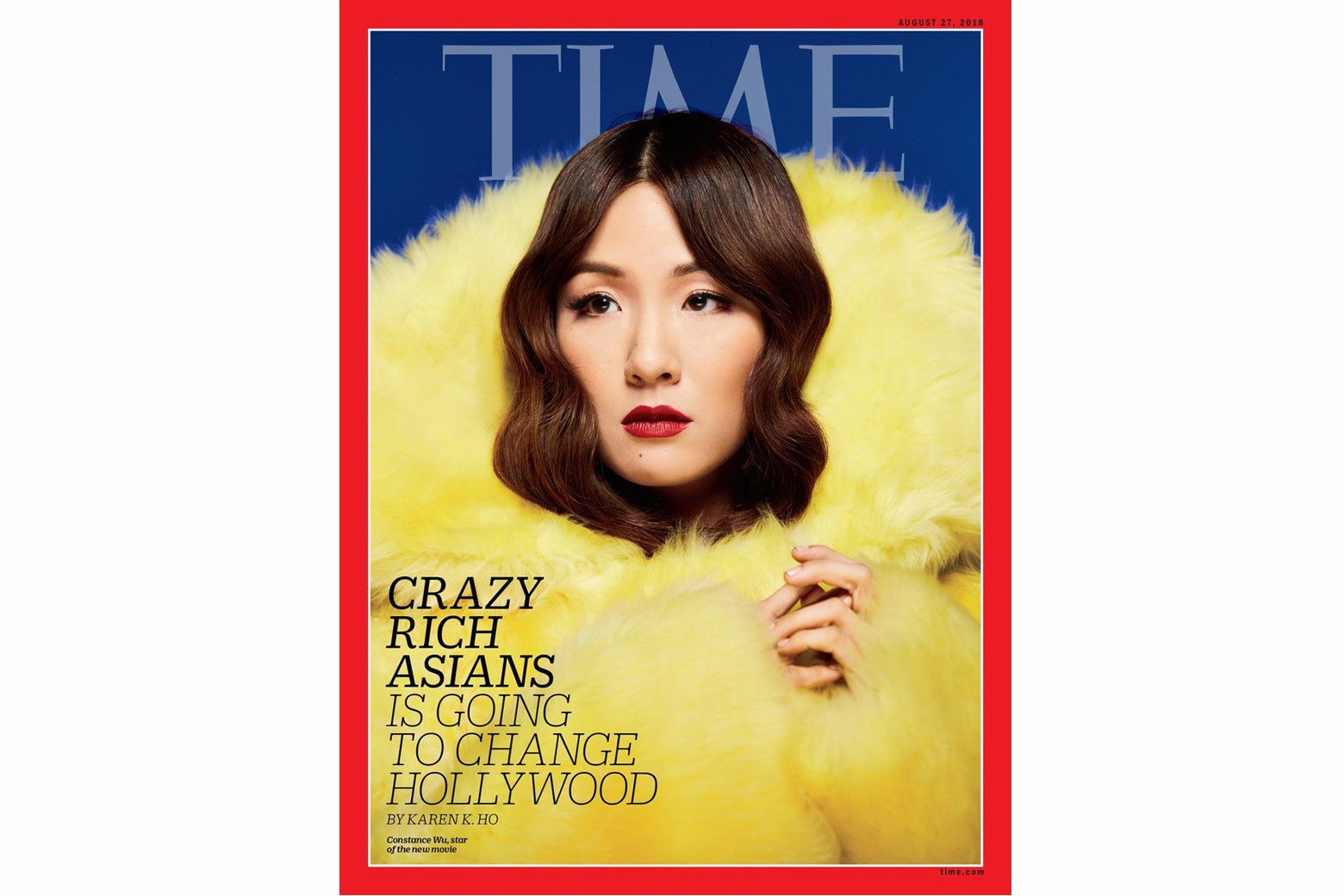 On the cover of Time Magazine, Constance Wu's head is engulfed by a jacket of fluffy yellow fur that takes up most of the cover. The headline is "Crazy Rich Asians Is Going to Change Hollywood."