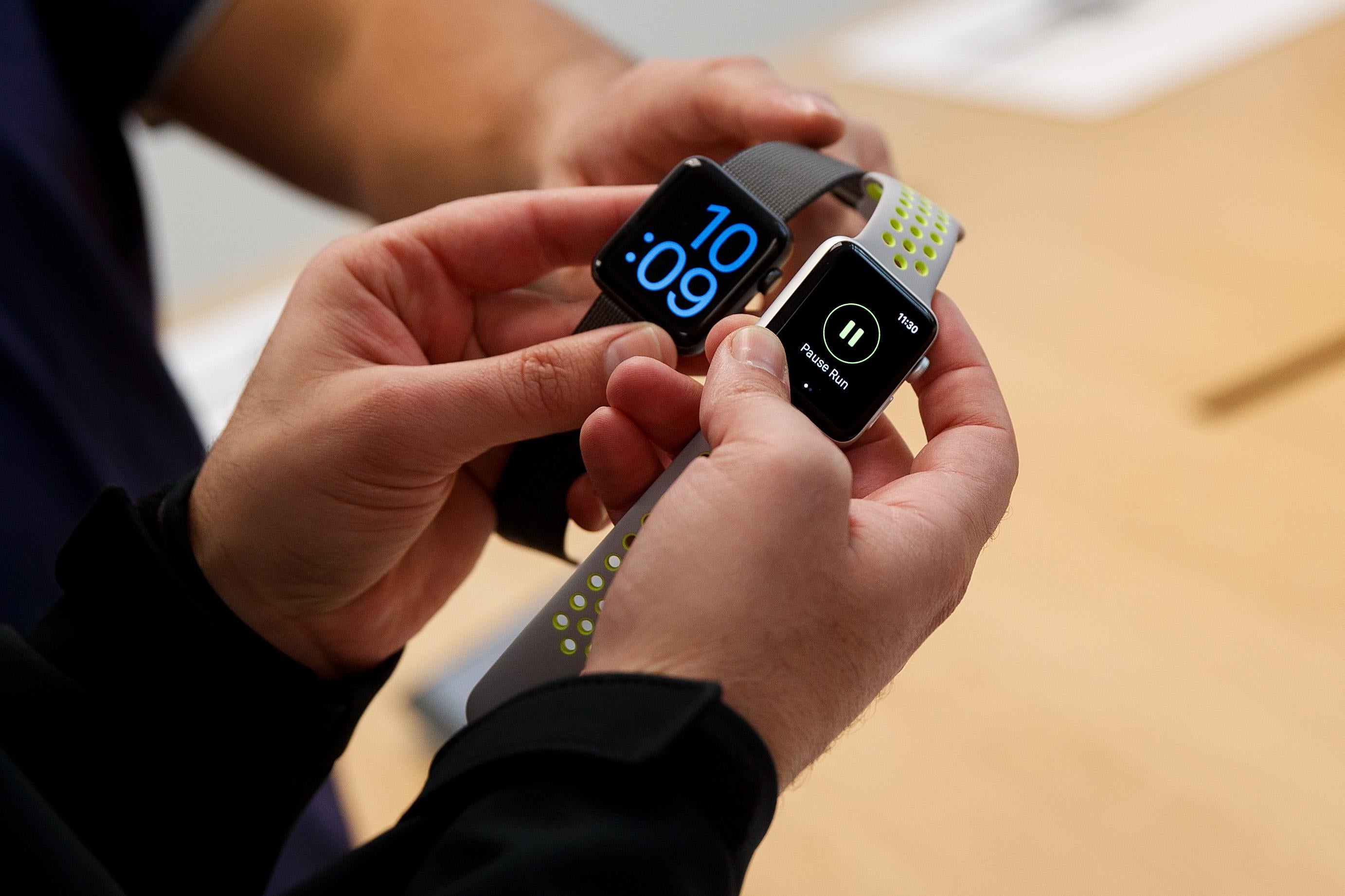 A customer looks at Apple Watch Nike+ at an Apple Store in the SoHo neighborhood of Manhattan, October 28, 2016 in New York City.