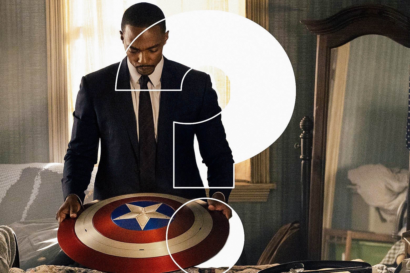He wears a dark suit (not the super kind) and stares down solemnly at Captain America’s shield.