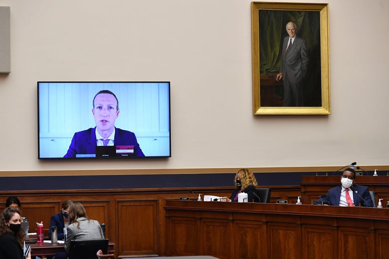 Mark Zuckerberg on a TV screen testifying before the House Judiciary Subcommittee on Antitrust, Commercial, and Administrative Law on July 29