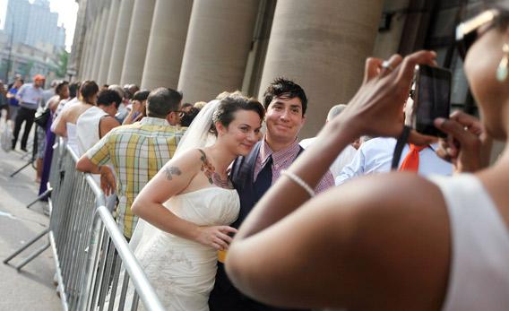 photographed waiting on line to get married at the Brooklyn.