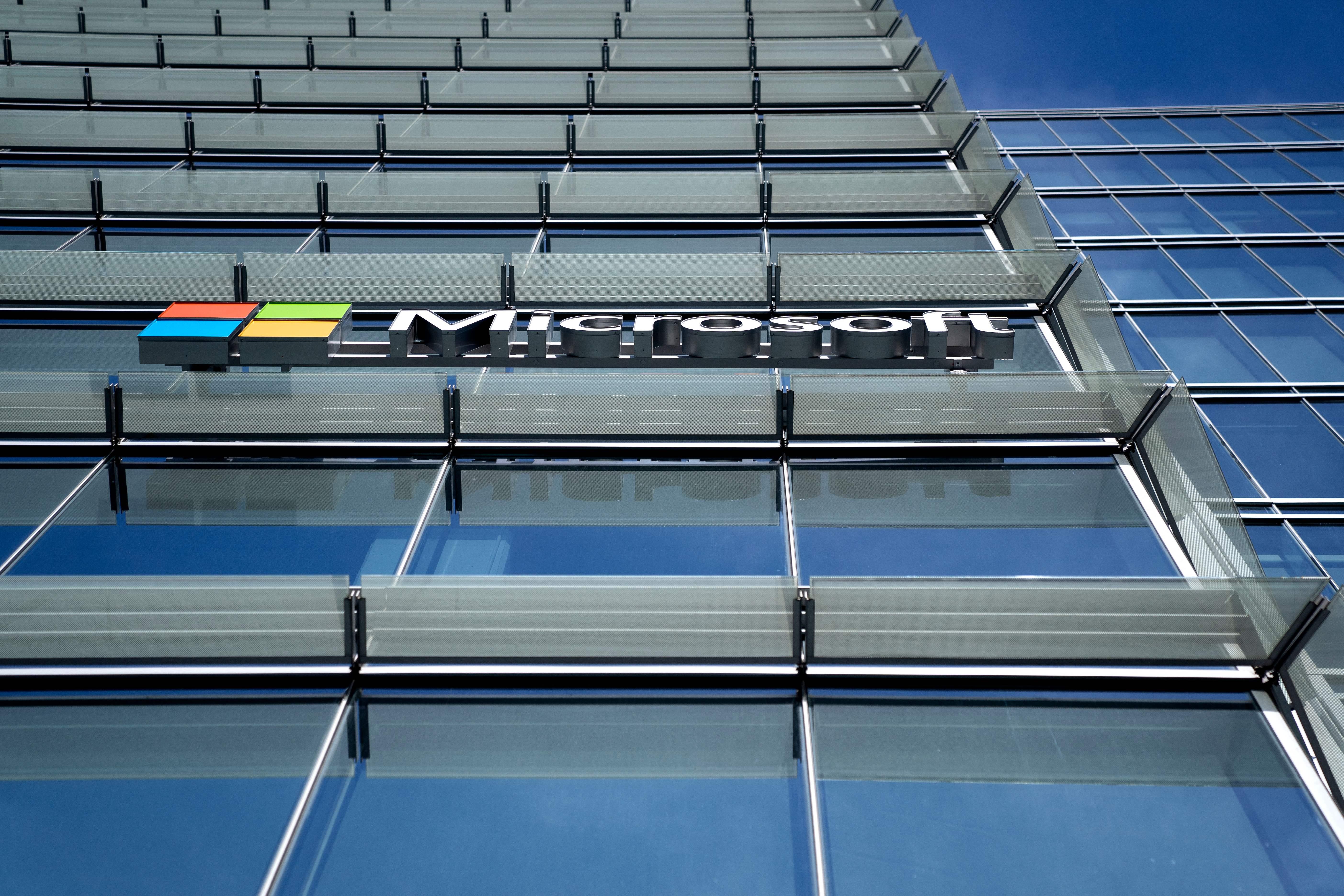 The Microsoft logo is displayed on an office building in Washington, DC, on February 15, 2023. - Retail sales in the United States rebounded in January, government data showed Wednesday, logging the biggest gain since early 2021 as policymakers watch for signs that consumer spending is cooling in the longer run. (Photo by Stefani Reynolds / AFP) (Photo by STEFANI REYNOLDS/AFP via Getty Images)