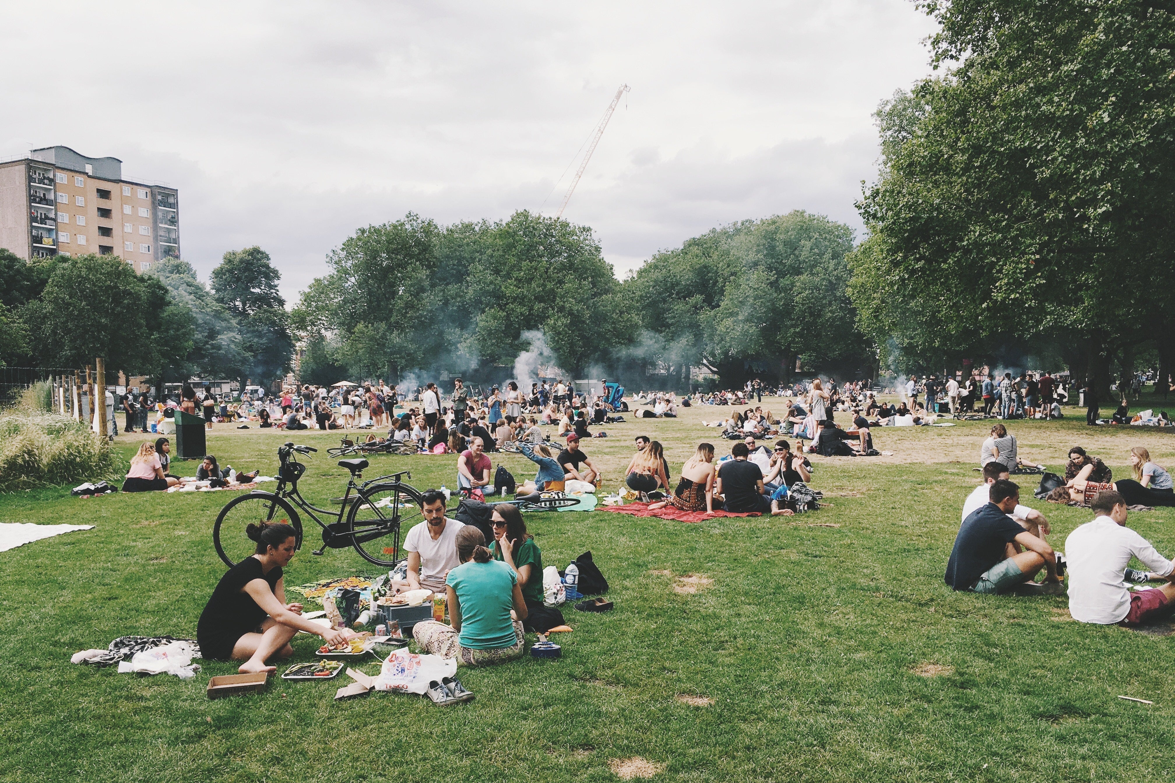 People picnicking in an urban park.