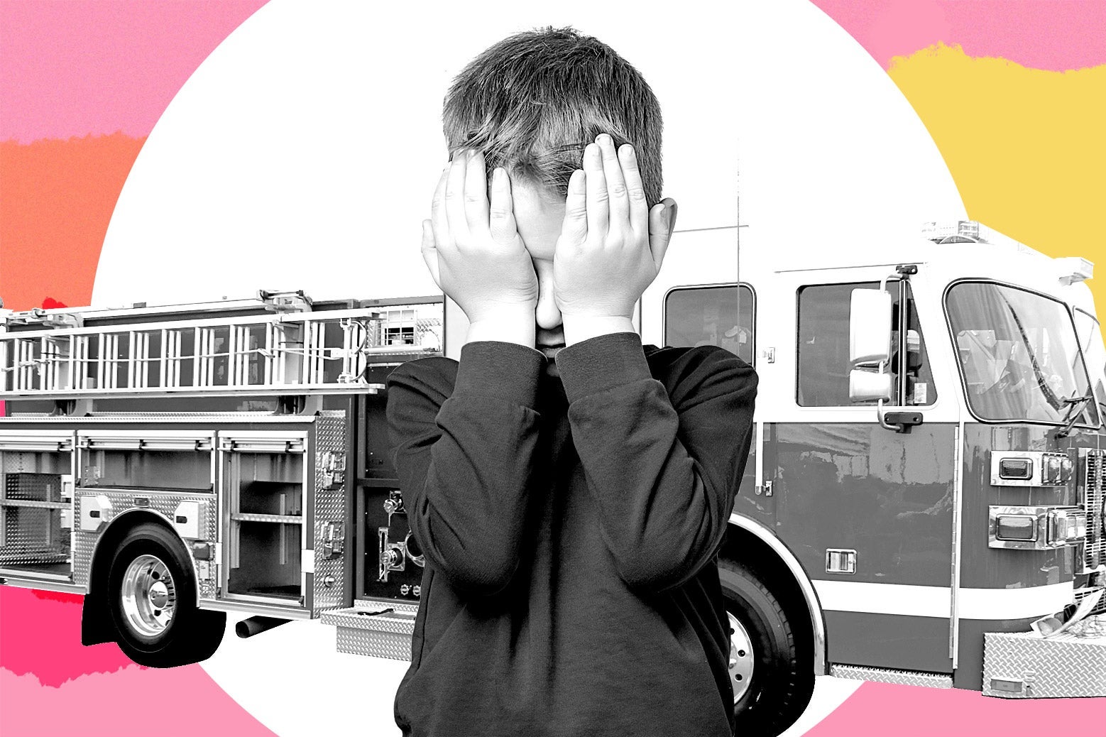 A child covers his eyes in front of a firetruck.