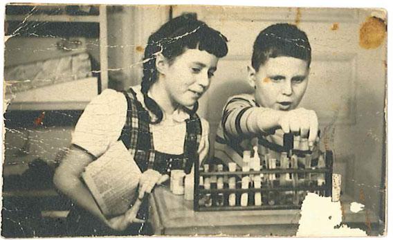Paul Plotz and his sister Liz with his chemistry set, probably in 1948.