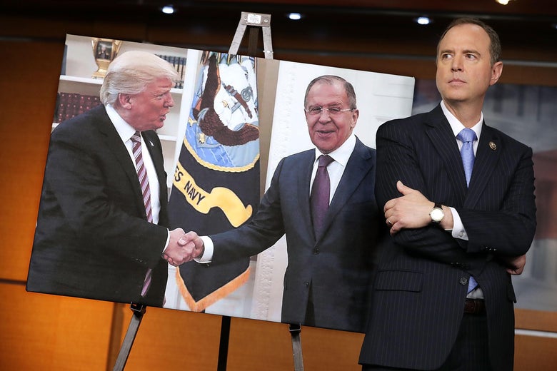 Rep. Adam Schiff (D-CA) stands next to a photograph of President Donald Trump and Russian Foreign Minister Sergey Lavrov during a news conference at the U.S. Capitol May 17, 2017 in Washington, D.C.